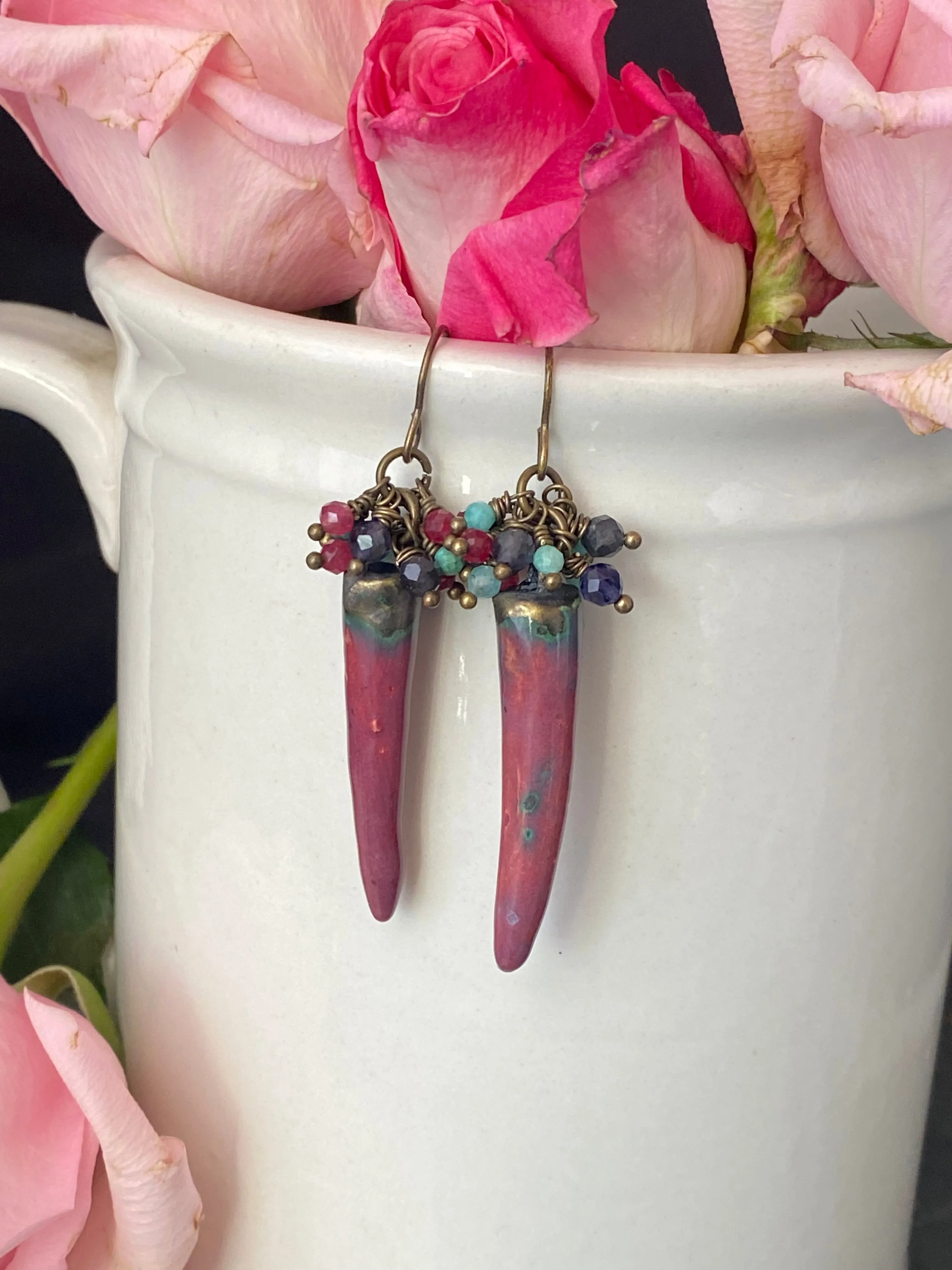 Mixed gemstones, handmade ceramic charms, bronze metal, earrings. Ruby, blue and amazonite
