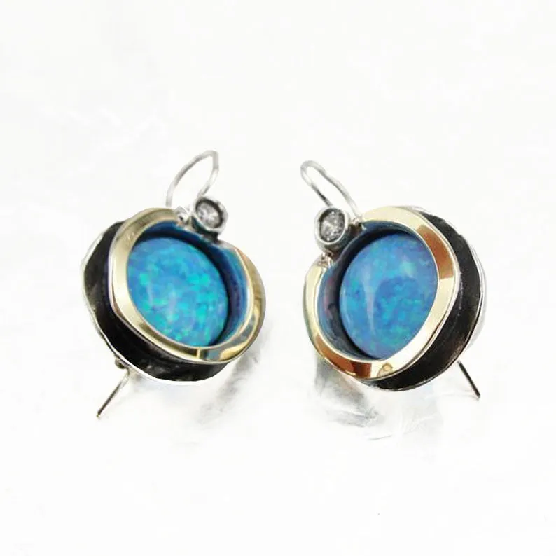 Round blue mosaic opal earrings base in Sterling silver and decorated with Gold